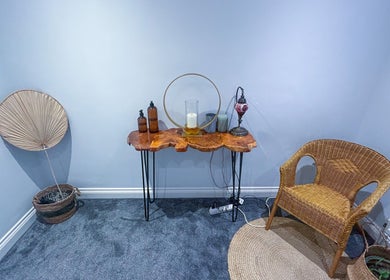 Tranquil therapy corner at Leme Personal Therapy, London, England, GB, featuring chic decor and cozy seating.