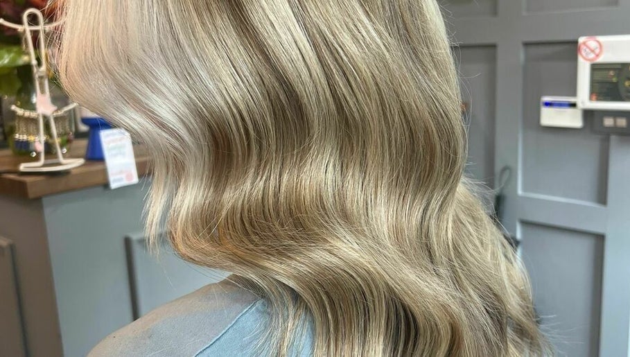 Elegant blonde waves styled at The Hair Cabin in Cambridge, England, GB.