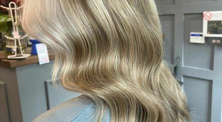Elegant blonde waves styled at The Hair Cabin in Cambridge, England, GB.