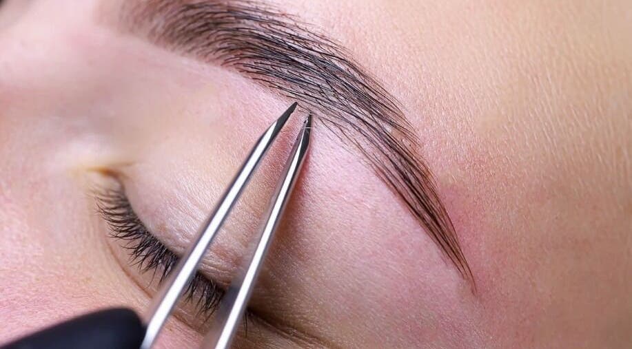 Eyebrow tweezing at Dolly's Hair, Beauty Salon, Inchture, Scotland, GB for flawless precision.