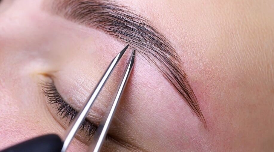 Eyebrow tweezing at Dolly's Hair, Beauty Salon, Inchture, Scotland, GB for flawless precision.