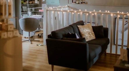 Relaxing lounge area at Victoria's Health and Beauty, Lurgan, Northern Ireland, GB, with comfortable seating.