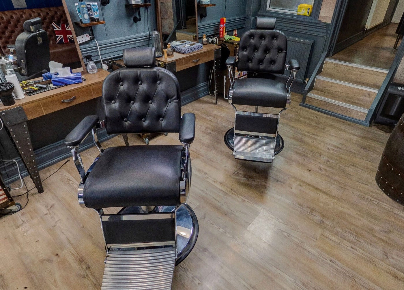 Barber chairs at Jonathan Ditton salons, Emsworth, England, GB with a vintage decor setting.