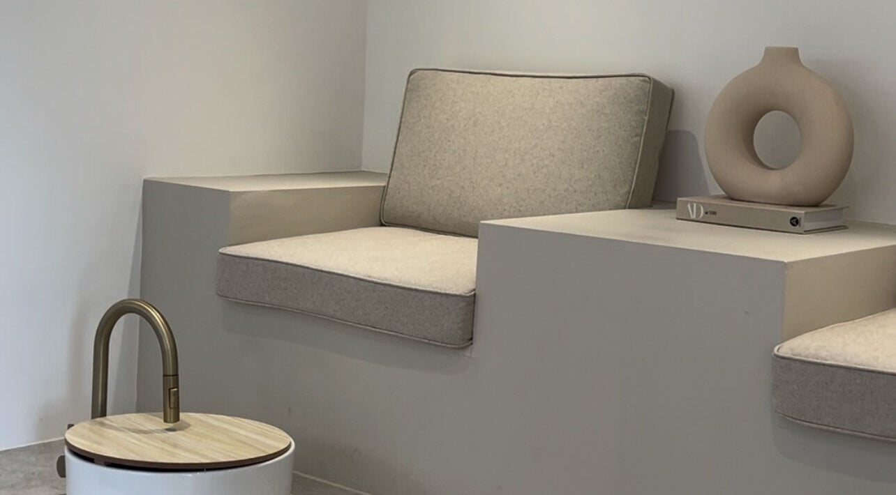 Modern seating area at Pure Indulgence, Great Sankey, England, GB, reflecting relaxation and style.