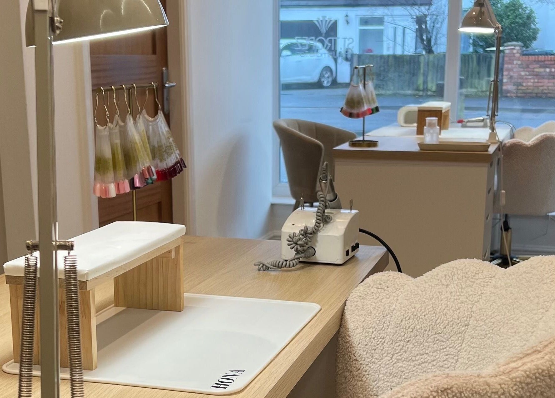Nail station at Pure Indulgence, Great Sankey, England, GB, showcasing a serene and sophisticated setup.