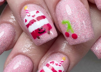 Birthday cake themed nail art by Em at The Parlour, Wirral, England, GB. Features pink glitter with cake design.