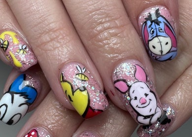 Cartoon nail art featuring classic characters at Em at The Parlour, Wirral, England, GB.