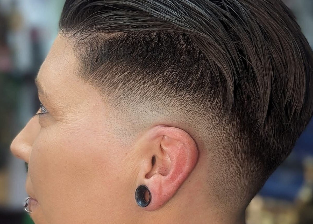 Close-up of a sleek fade haircut at Uppercuts Barbershop LLC, Plainfield, Connecticut, US.