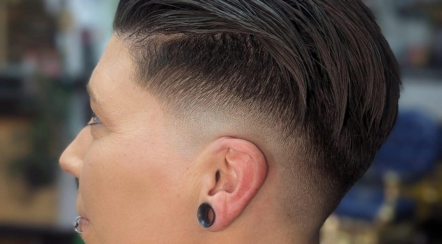 Close-up of a sleek fade haircut at Uppercuts Barbershop LLC, Plainfield, Connecticut, US.
