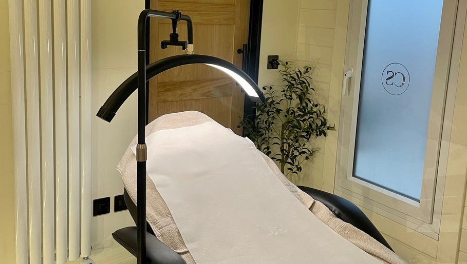 Calming treatment room at Costa Skin Clinic, Alnwick, England, GB, featuring massage table and ambient lighting.