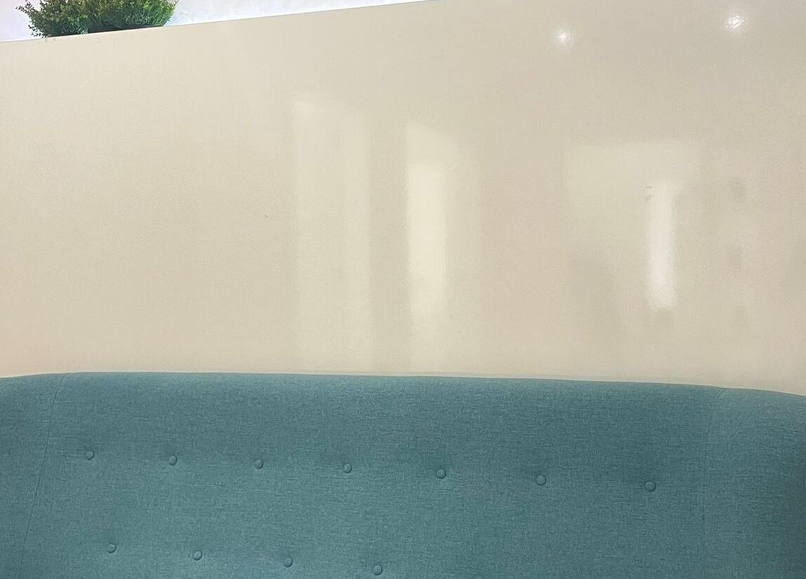 Elegant blue sofa at Dermalife Bulgaria in Sofia, Sofia City Province, BG offering a relaxing ambiance.