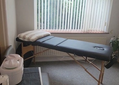 Comfortable massage table in tranquil room at Sugar and Beauty, Antrim, Northern Ireland, GB.