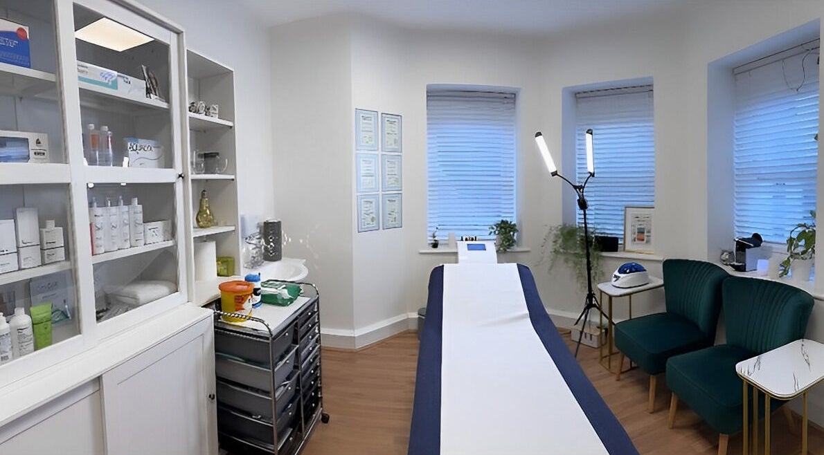Peaceful treatment room at Mind Body Wellness in London, England, GB, featuring modern decor and soft lighting.