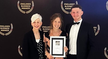 Serene Holistics And Beauty team at awards in Shrewsbury, England, GB holding a framed certificate.