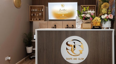 Elegant reception at Shape and Glow in Blacktown, NSW, AU with flowers and signage.