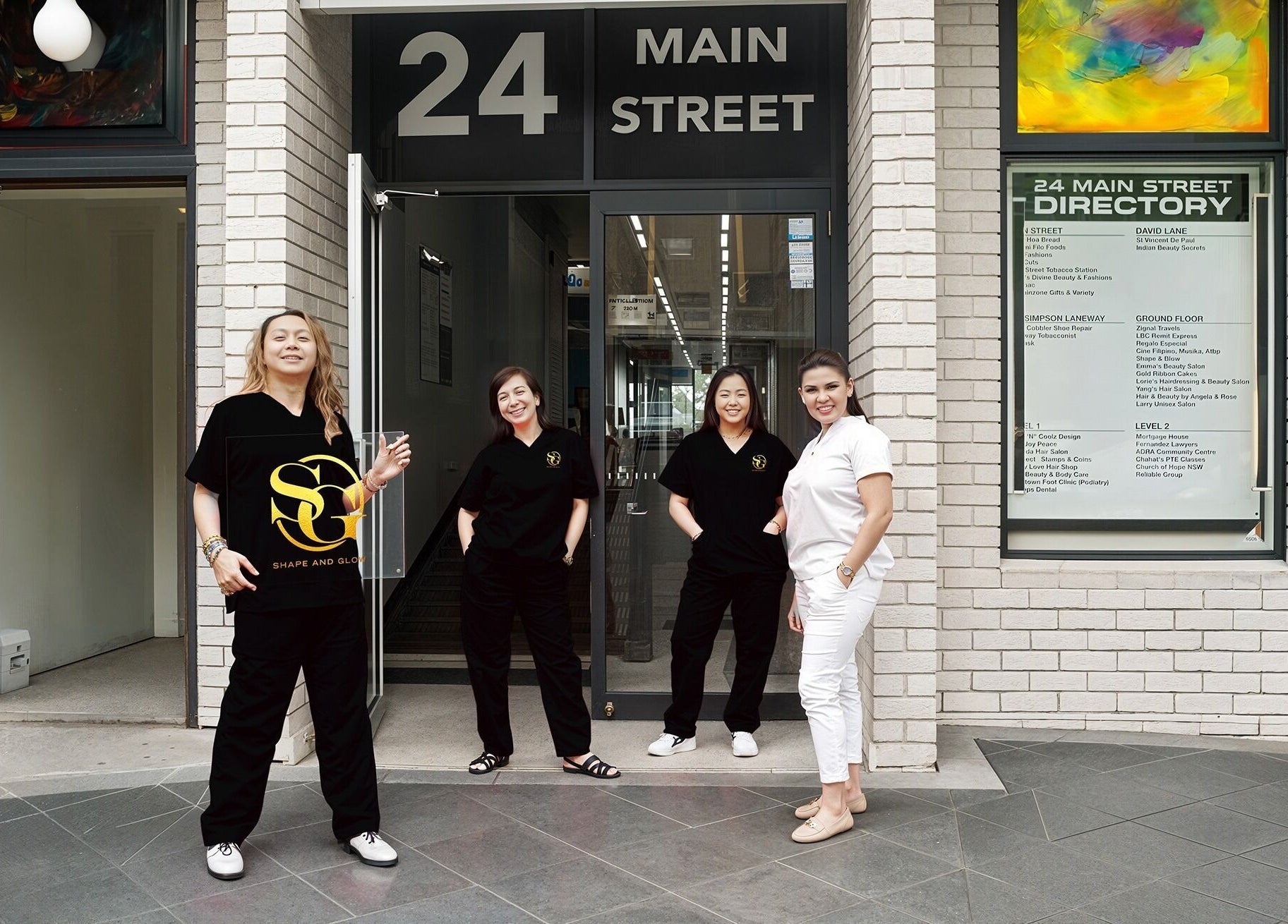 Team of Shape and Glow outside the venue at 24 Main Street, Blacktown, NSW, AU, welcoming guests.