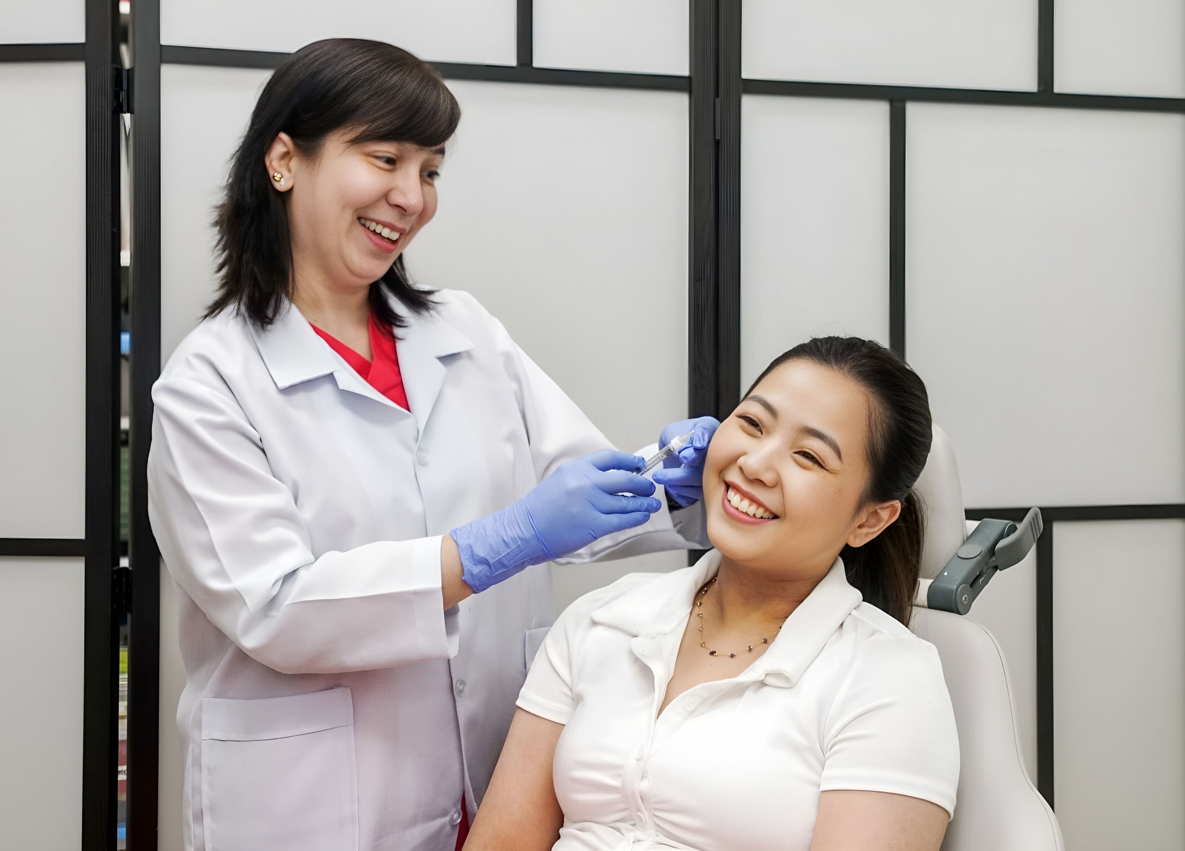 Professional skin treatment at Shape and Glow, Blacktown, NSW, AU, with a smiling client in a relaxed setting.