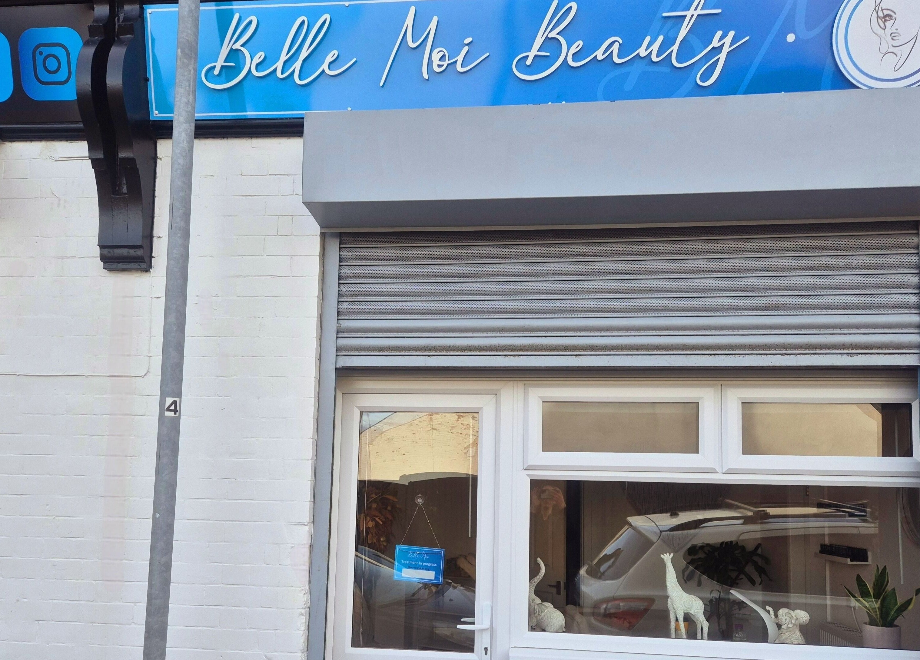 Chic entrance of Belle Moi Beauty in Sutton-in-Ashfield, England, showcasing modern design.