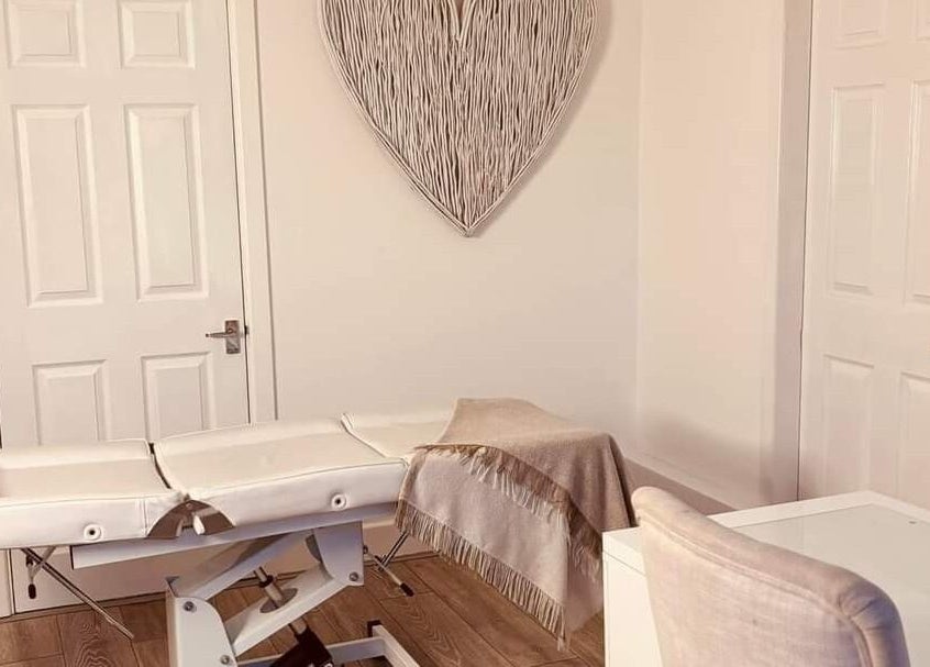 Treatment room at Belle Moi Beauty in Sutton-in-Ashfield, England, GB with a white bed and cozy decor.
