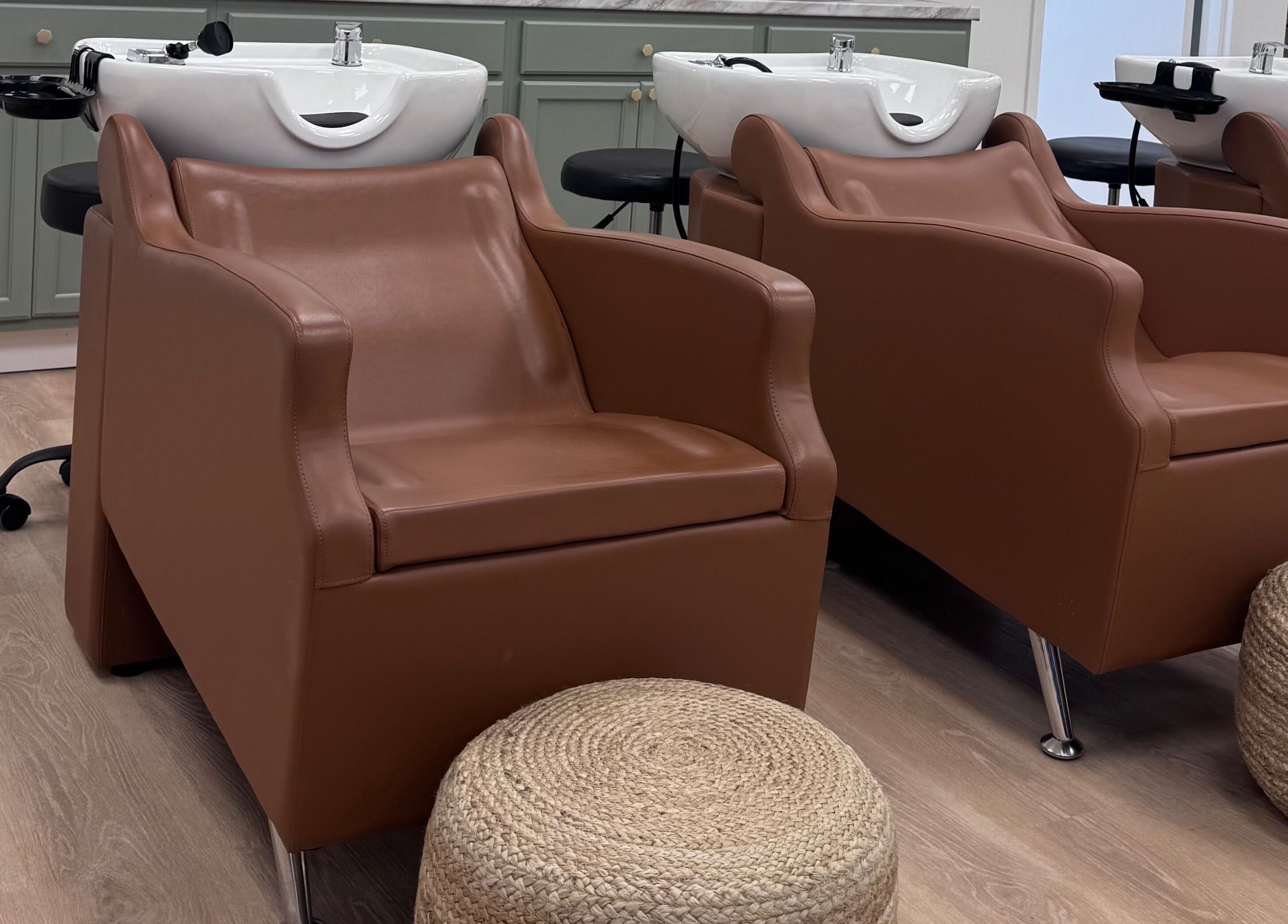 Luxurious hair wash stations at Ellie Salon, Old Forge, Pennsylvania, US, showcasing comfort and style.