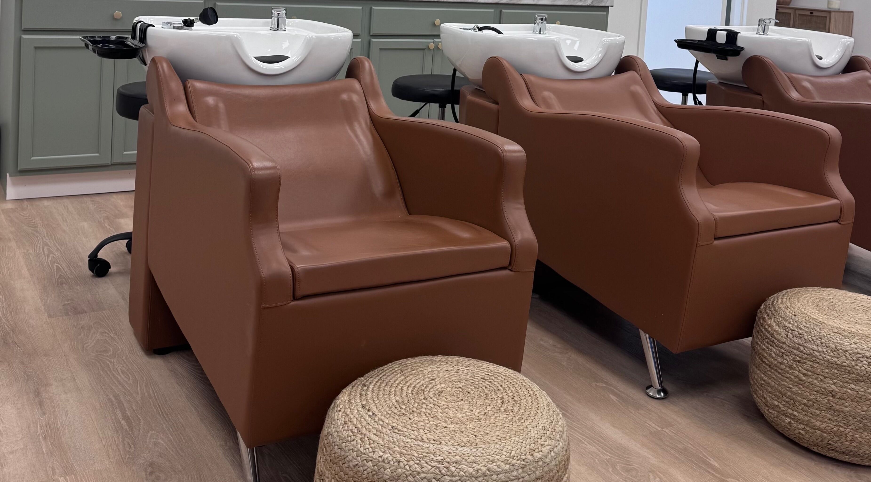 Luxurious hair wash stations at Ellie Salon, Old Forge, Pennsylvania, US, showcasing comfort and style.