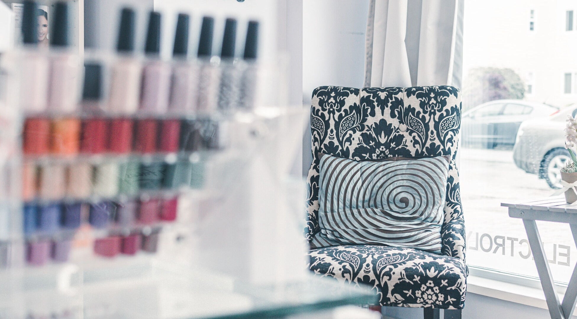 Elegant chair with nail polishes at Spa at the Madison, Burnaby, BC, CA invites relaxation.