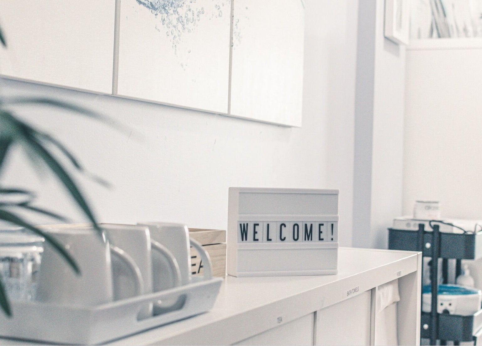 Welcome sign at Spa at the Madison, Burnaby, BC, CA. Inviting entry with a modern, calming decor.