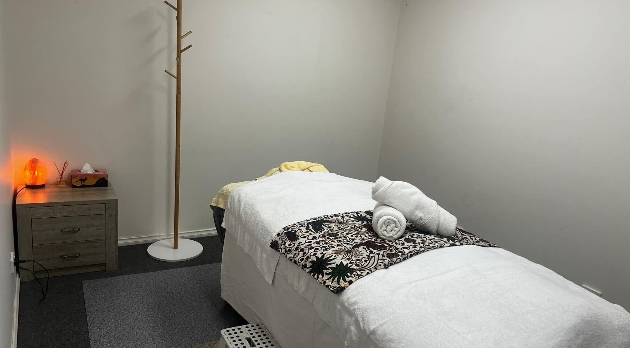 Tranquil massage room with salt lamp at Lemon Essential Massage & Spa Shepparton, Victoria, AU.