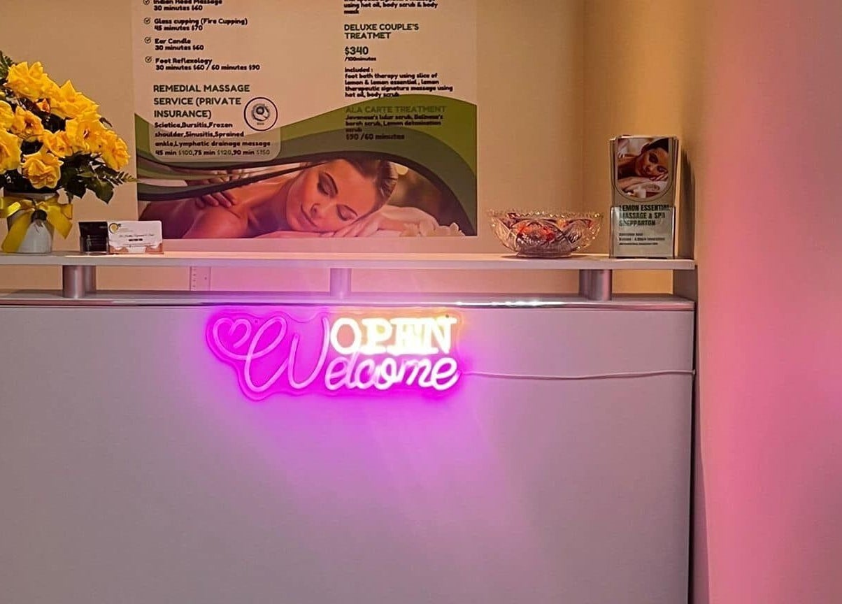 Welcoming reception at Lemon Essential Massage & Spa Shepparton, Shepparton, Victoria, AU with glowing neon sign.