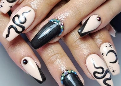 Chic nail art with black and nude design at MiiMii Beauty Lounge in Cape Town, Western Cape, ZA.