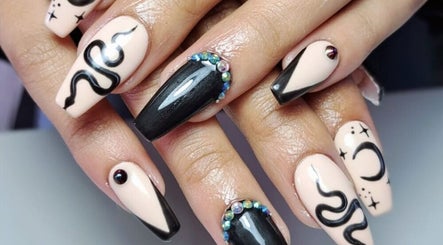 Chic nail art with black and nude design at MiiMii Beauty Lounge in Cape Town, Western Cape, ZA.