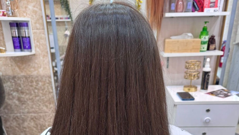 Smooth, straightened hair styled at Moon Valley Shine Spa - Home Service in Dubai, AE.