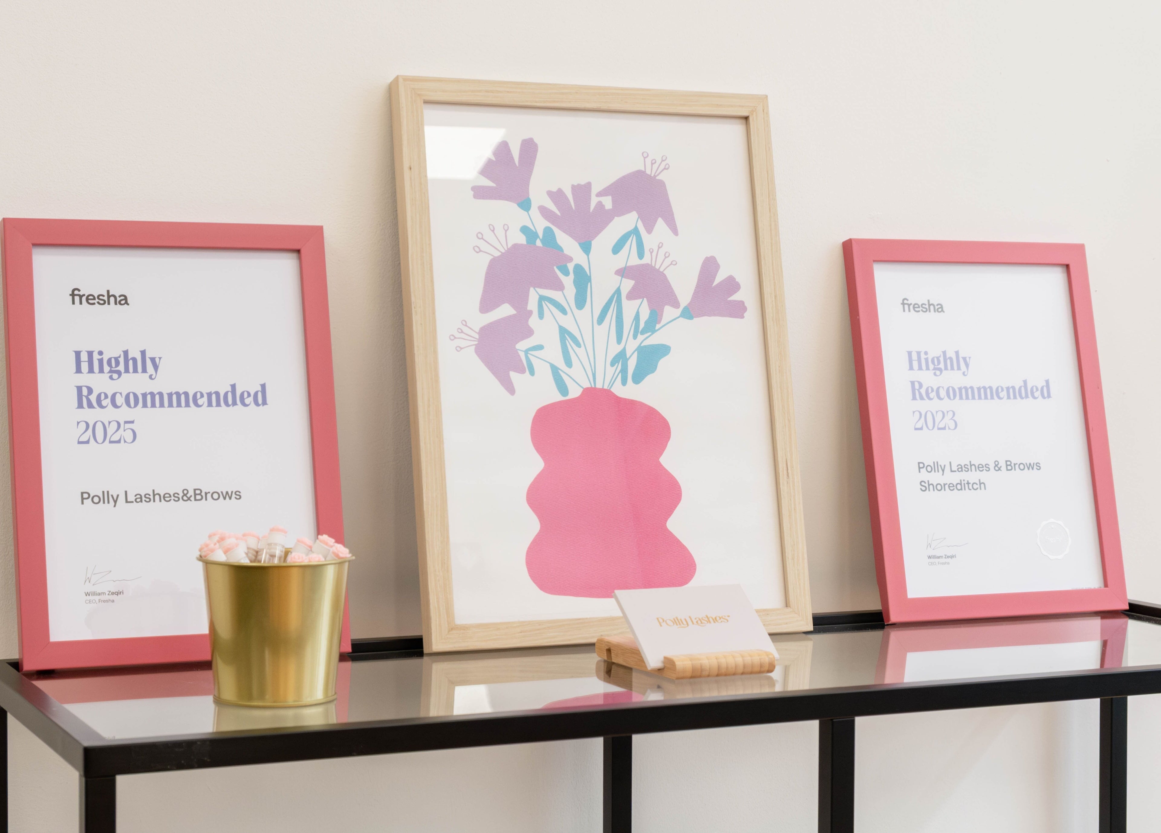 Awards and art at Polly Lashes & Brows London, England, GB showcasing excellence in beauty services.