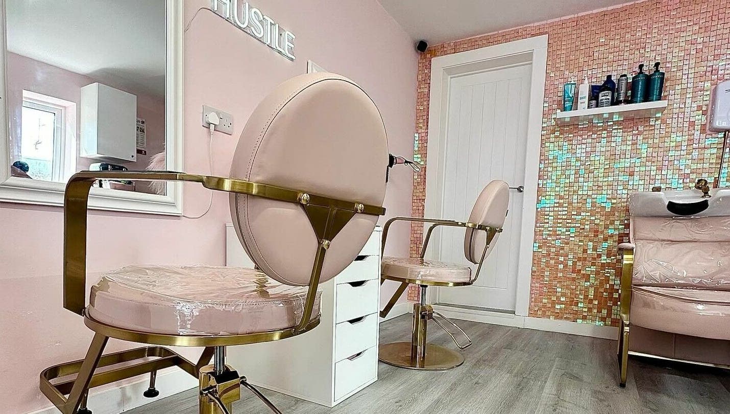 Lux Locks by Edie salon chairs in stylish pink interior, Bexhill, England, GB.