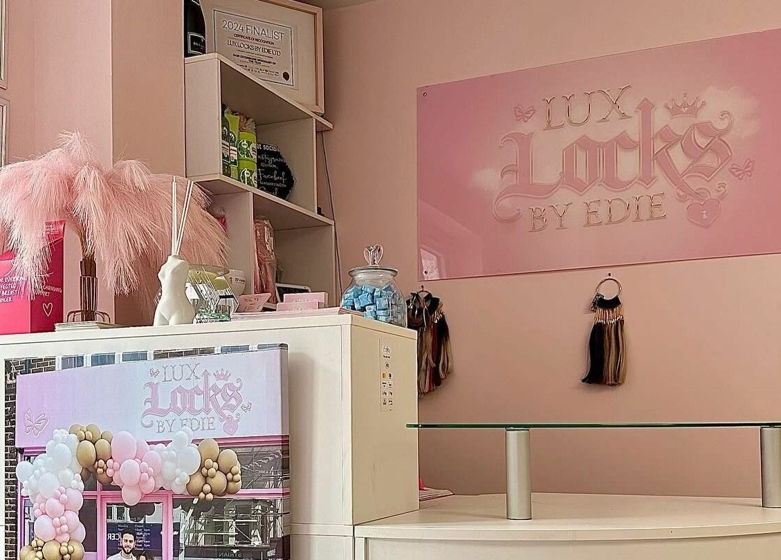 Interior of Lux Locks by Edie in Bexhill, England, showcasing elegant design and hair extension displays.