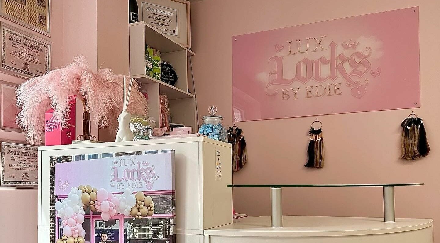 Interior of Lux Locks by Edie in Bexhill, England, showcasing elegant design and hair extension displays.