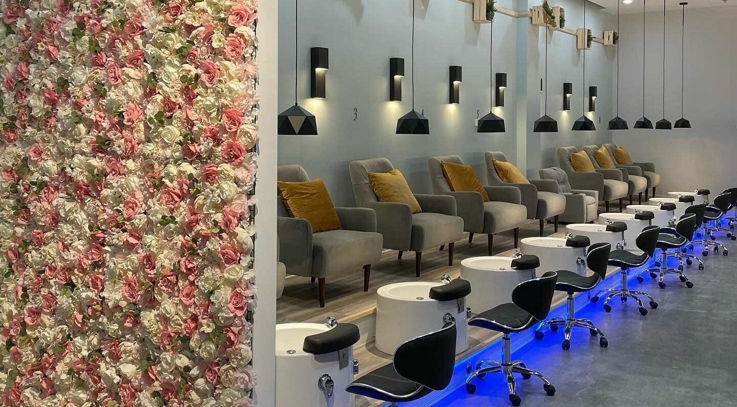 Elegant pedicure chairs with floral decor at Posh Polish Nail Salon, Westfield, Indiana, US.