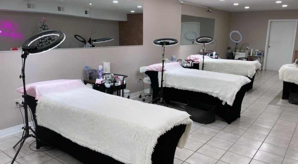 Cozy treatment beds at Piped By Martina in Jersey City, New Jersey, US, offering a relaxing wellness experience.