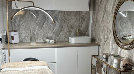 Elegant treatment room at The Secret Clinic✨️, Nuneaton, England MP, GB with sleek decor and wellness setup.