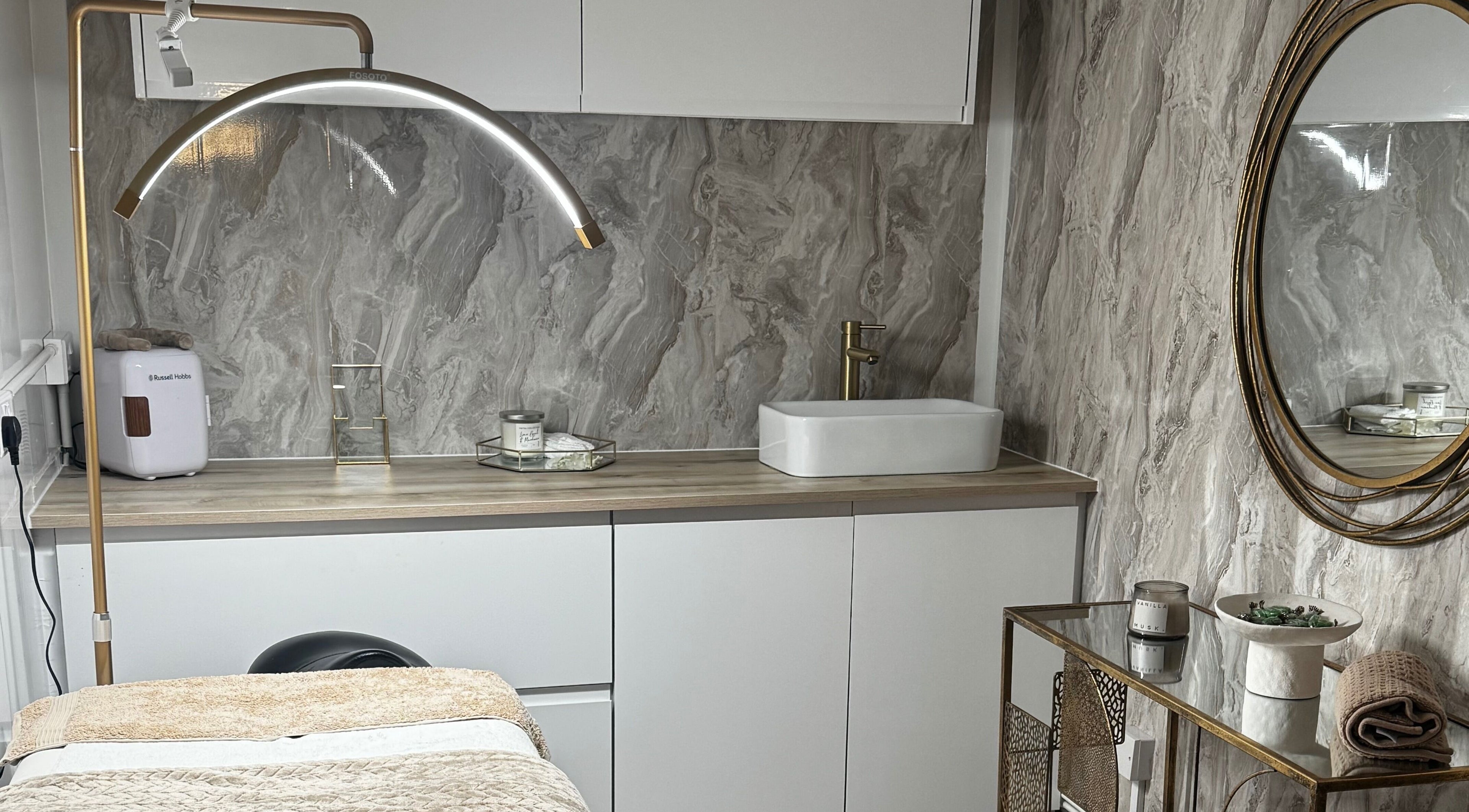 Elegant treatment room at The Secret Clinic✨️, Nuneaton, England MP, GB with sleek decor and wellness setup.