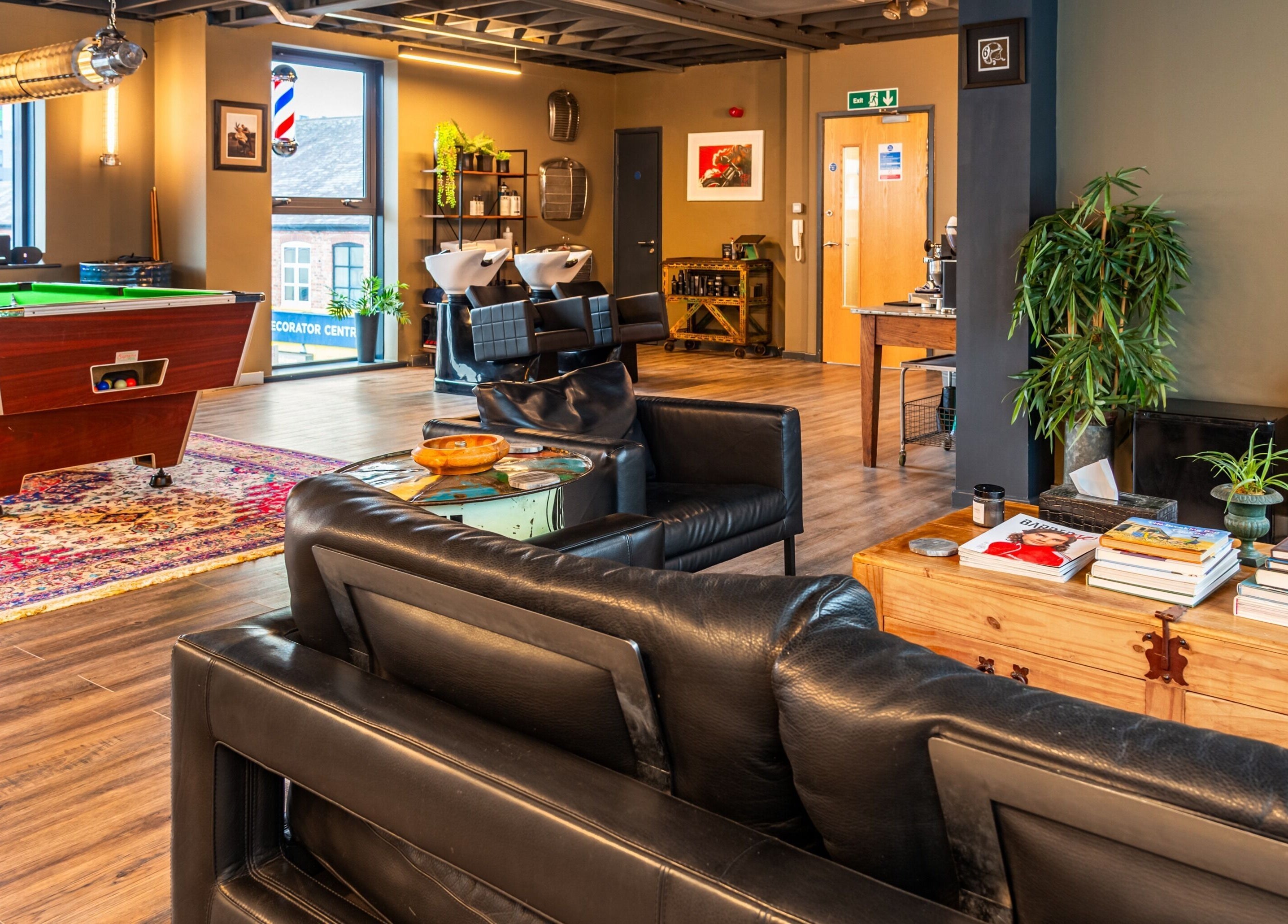 Chic interior of Boilerhouse Gentleman - Ouseburn, featuring a pool table and seating in Newcastle upon Tyne, England, GB.
