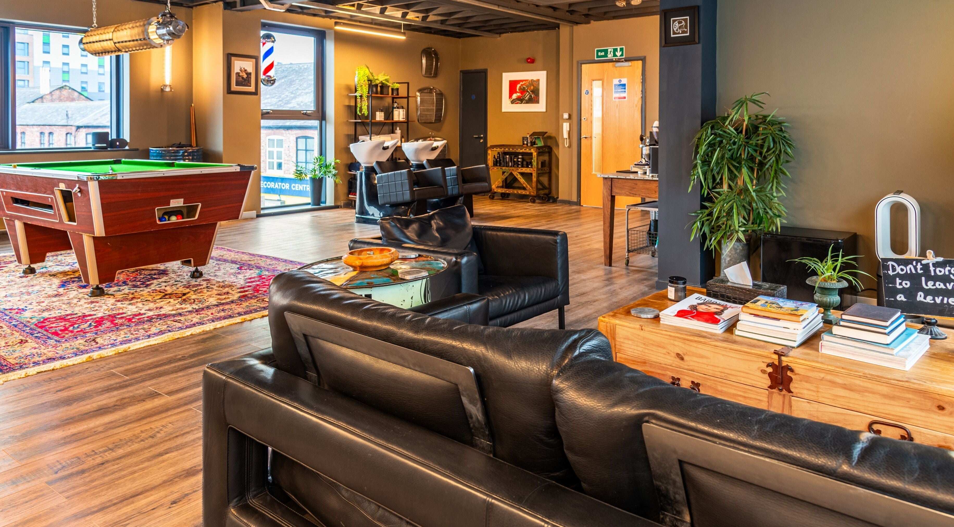 Chic interior of Boilerhouse Gentleman - Ouseburn, featuring a pool table and seating in Newcastle upon Tyne, England, GB.