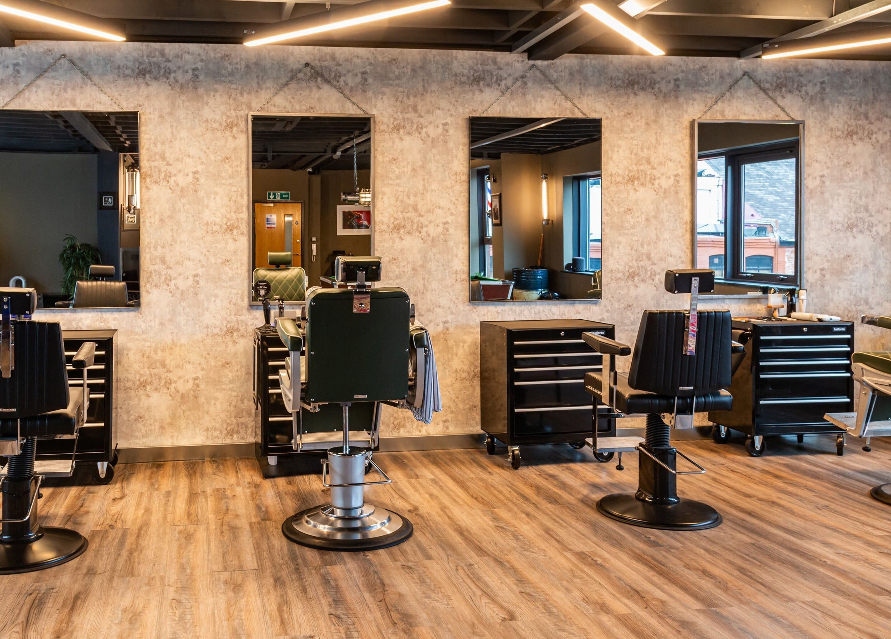 Modern barber chairs at Boilerhouse Gentleman - Ouseburn, Newcastle upon Tyne, England, GB.