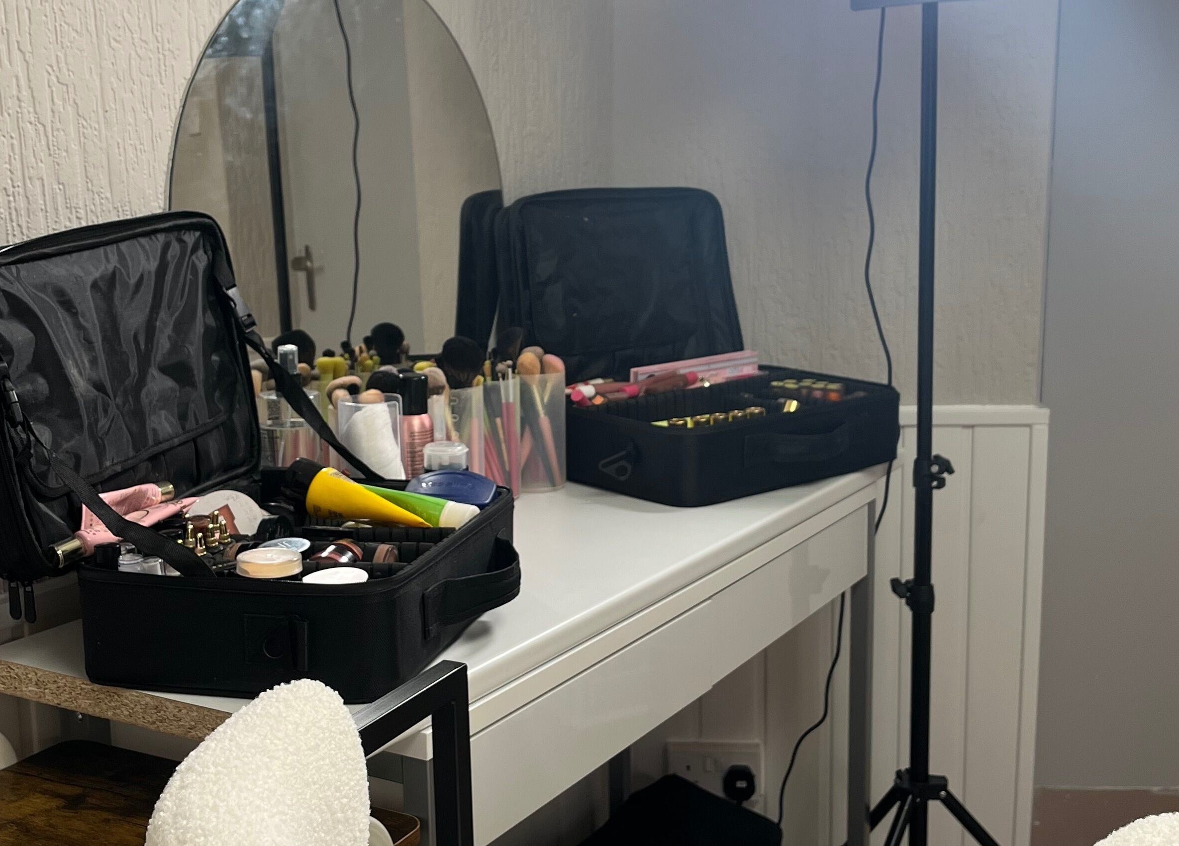 Makeup setup at Bella by Ella in Douglas, Douglas, IM, featuring a vanity with beauty products.