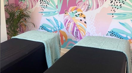 Relaxing massage room at BM Pressed in Westville, Kwazulu-natal, ZA with tropical-themed decor.