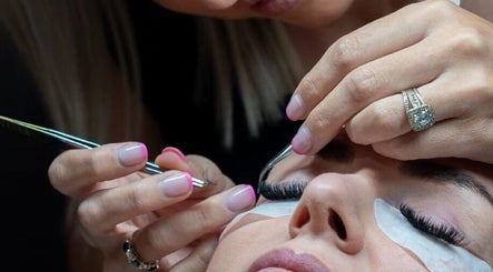 Close-up of eyelash application at BM Pressed in Westville, Kwazulu-natal, ZA, showcasing precise technique.