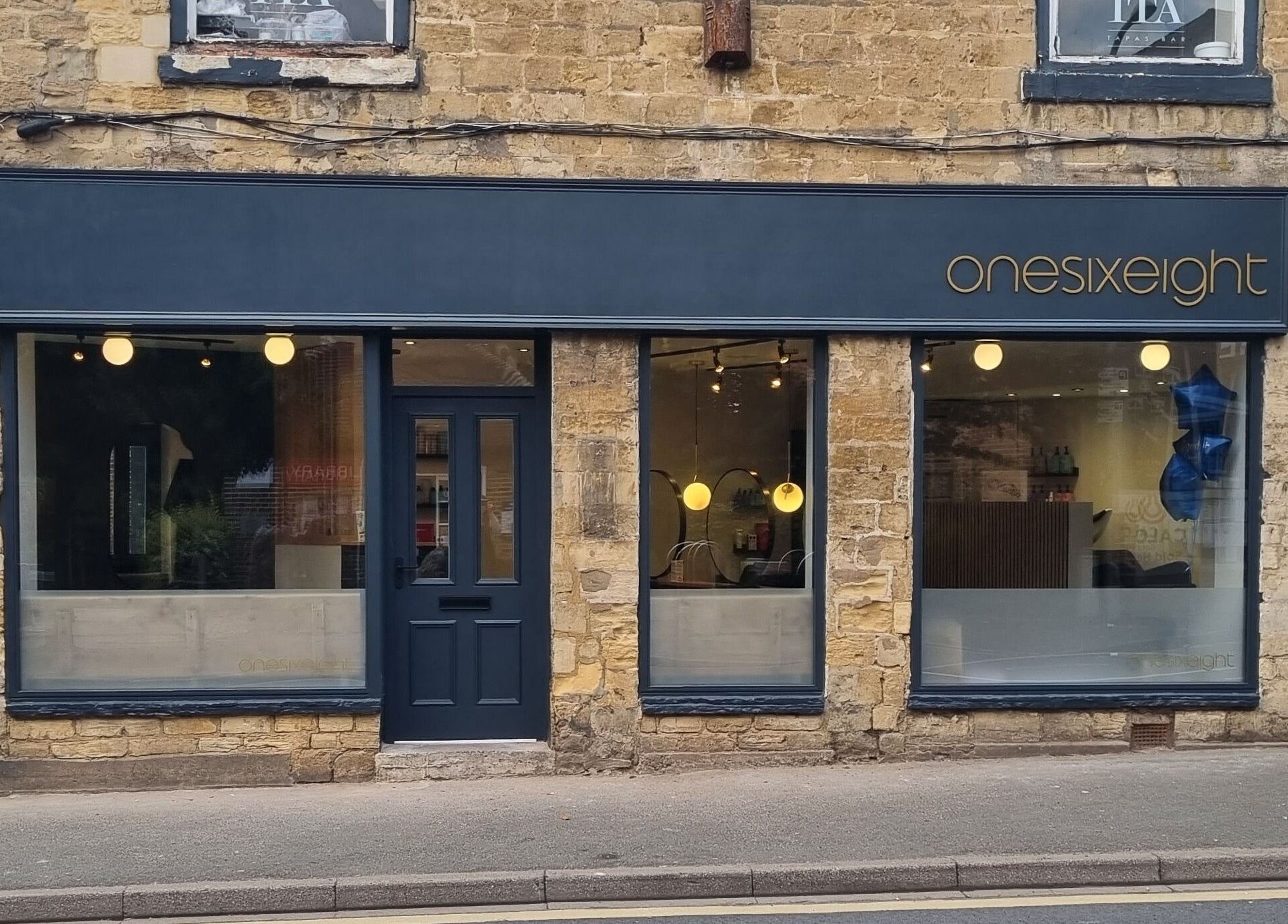 Front view of Onesixeight beauty venue in Boston Spa, England, GB, showcasing modern design and inviting atmosphere.