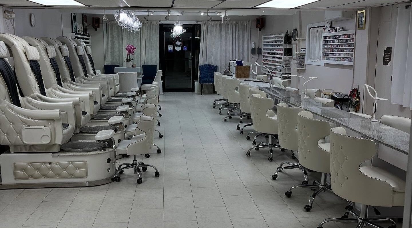 Luxurious interior of Nail Creations Lounge and Spa - Beverly, MA location with elegant seating. Beverly, Massachusetts, US.