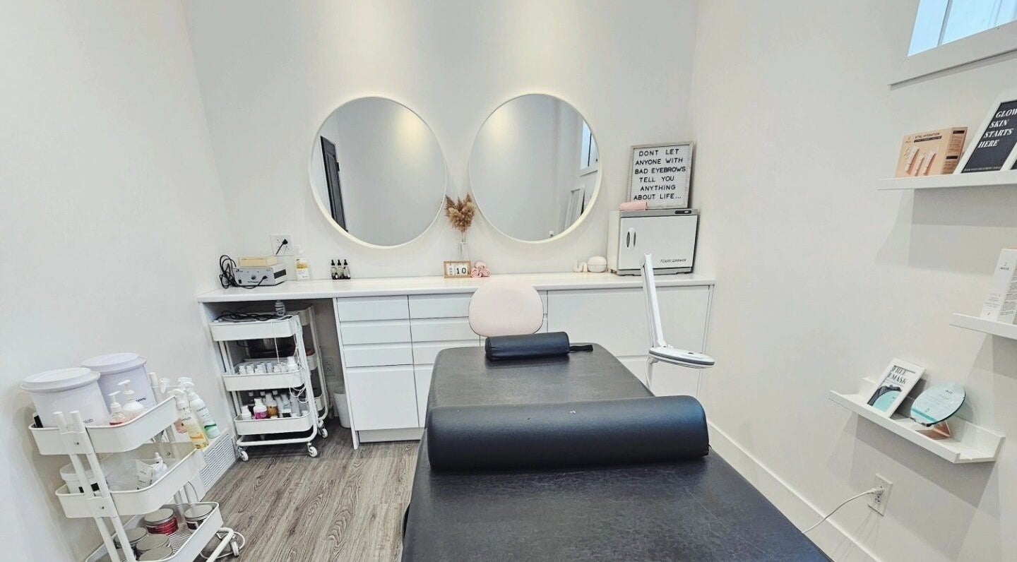Modern treatment room at Beauty by Danusja, Winnipeg, Manitoba, CA, showcasing elegant decor and equipment.