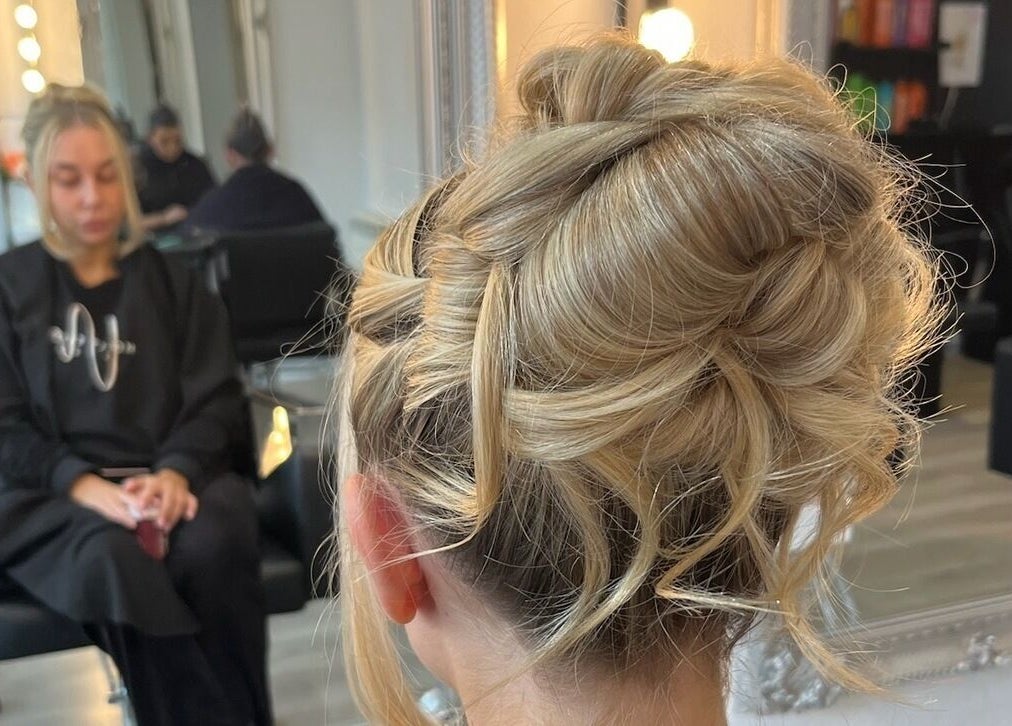 Stylish updo hair design at Eleanor Rose Hair in Accrington, England, GB.